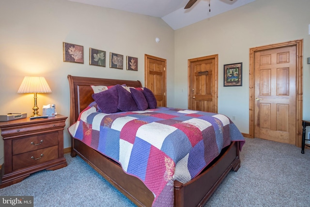 carpeted bedroom with lofted ceiling, a ceiling fan, and baseboards