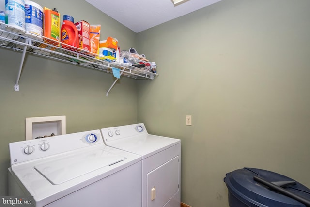 clothes washing area with laundry area and separate washer and dryer