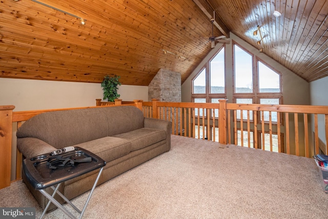 carpeted living room with wooden ceiling, vaulted ceiling, and track lighting