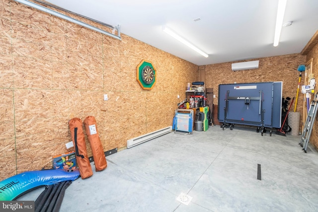 storage room featuring a baseboard heating unit and a garage