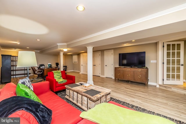 living area with wood finished floors, baseboards, decorative columns, recessed lighting, and ornamental molding