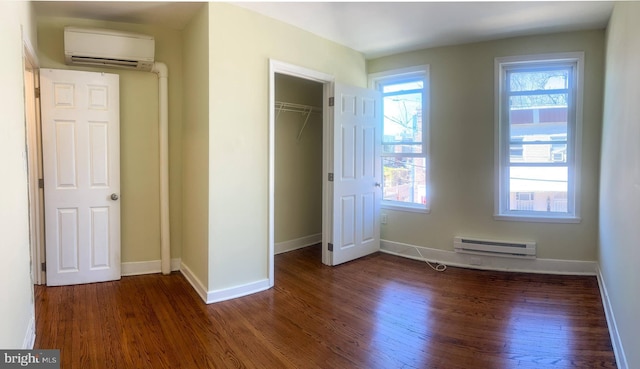 2837 Stouton St, Philadelphia, PA 19134 - unfurnished bedroom featuring baseboards, dark wood-style floors, a baseboard heating unit, and an AC wall unit