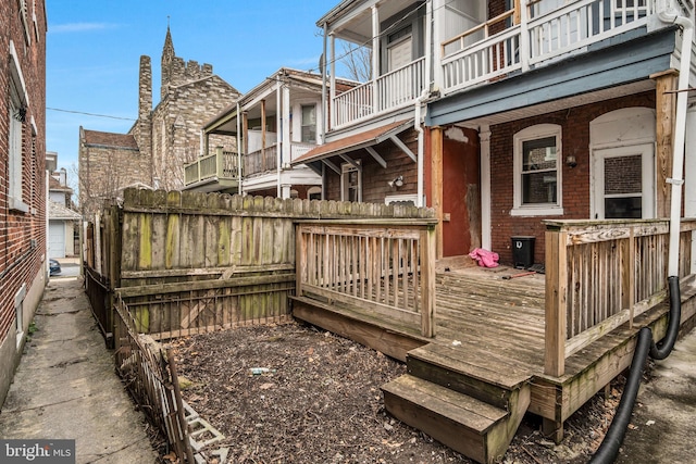 wooden deck featuring fence