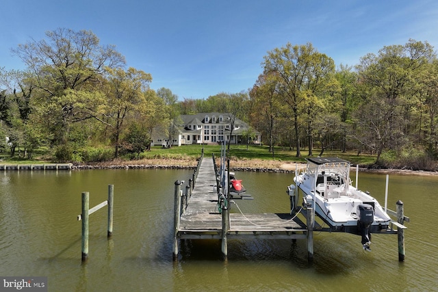 view of dock with a water view and boat lift