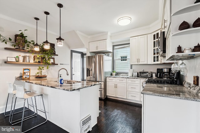 kitchen with open shelves, stone countertops, a sink, stainless steel appliances, and crown molding