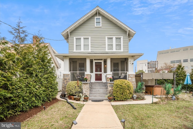 view of front of home with a front lawn