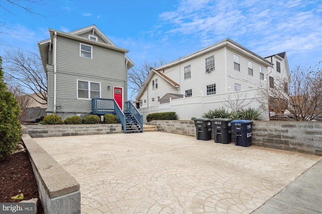 rear view of house featuring a patio