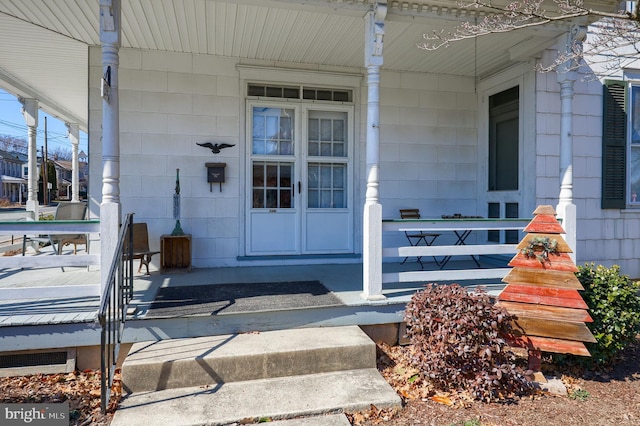 entrance to property with a porch