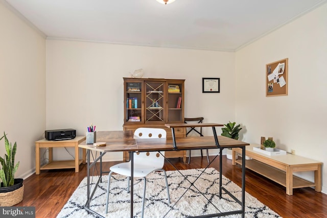 office with ornamental molding, wood finished floors, and baseboards