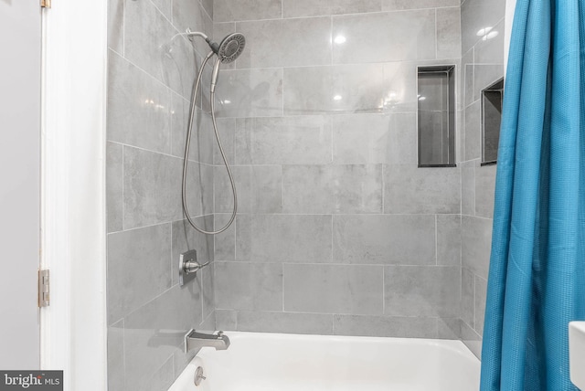 full bath featuring shower / bath combination with curtain