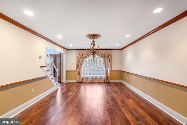 unfurnished dining area with baseboards, recessed lighting, wood finished floors, and an inviting chandelier