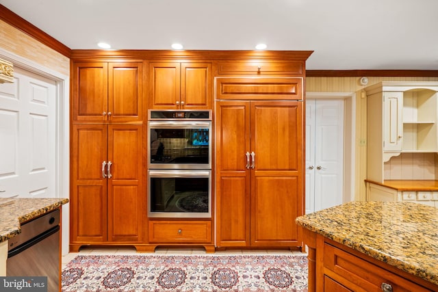 kitchen featuring double oven, brown cabinets, light stone counters, and light tile patterned flooring