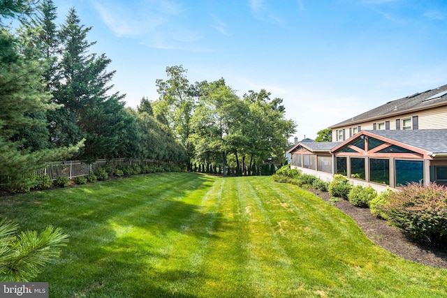 view of yard with fence