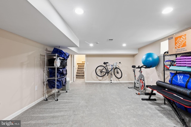 exercise room with recessed lighting, baseboards, and carpet floors