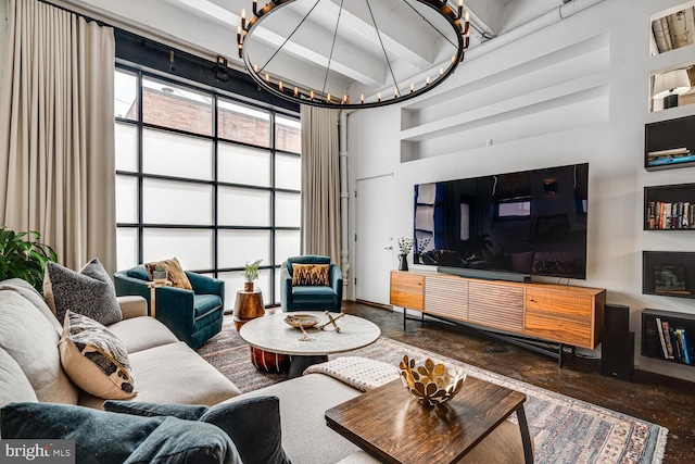 living area with a high ceiling