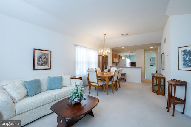 living room featuring a chandelier, light colored carpet, visible vents, and recessed lighting