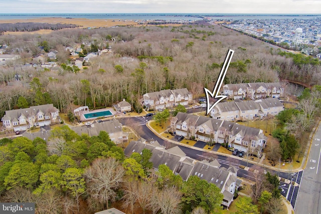 birds eye view of property with a residential view