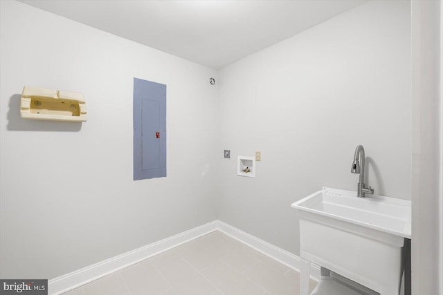 washroom featuring hookup for a washing machine, electric dryer hookup, laundry area, electric panel, and baseboards