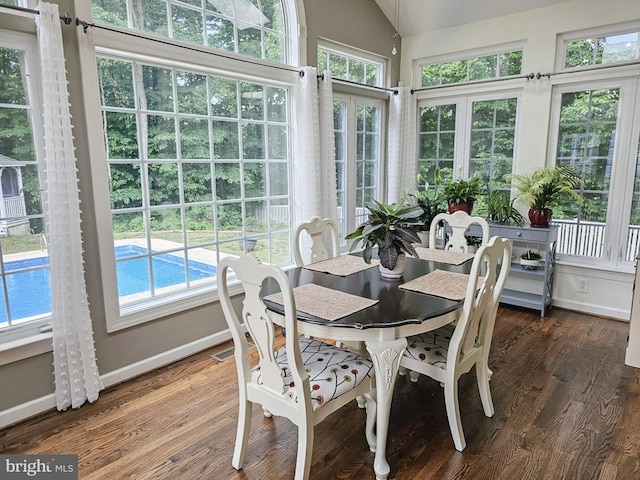 sunroom / solarium with lofted ceiling