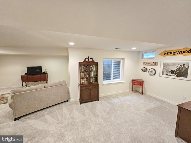 carpeted living room with baseboards and recessed lighting