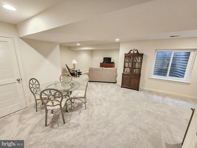 dining area featuring baseboards, carpet floors, and recessed lighting