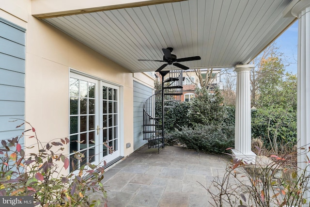 view of patio / terrace with stairway, a ceiling fan, and french doors