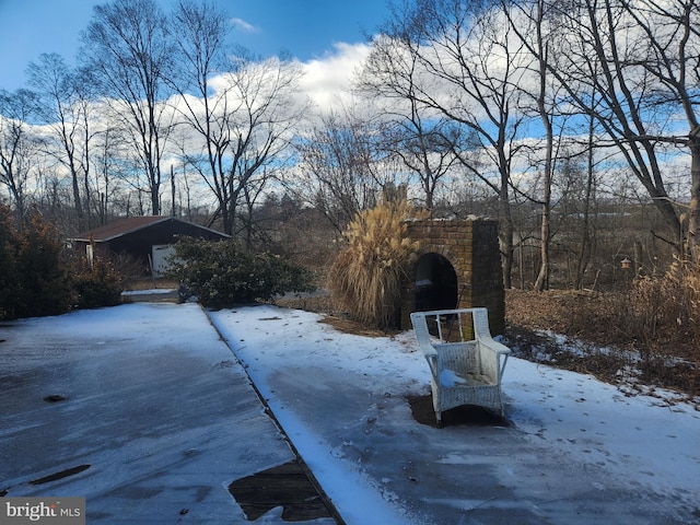 exterior space with stone siding