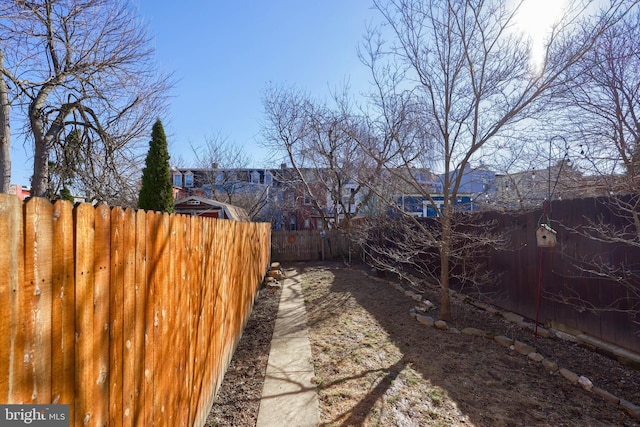 view of yard featuring a fenced backyard