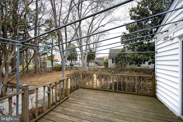 deck featuring a residential view and fence