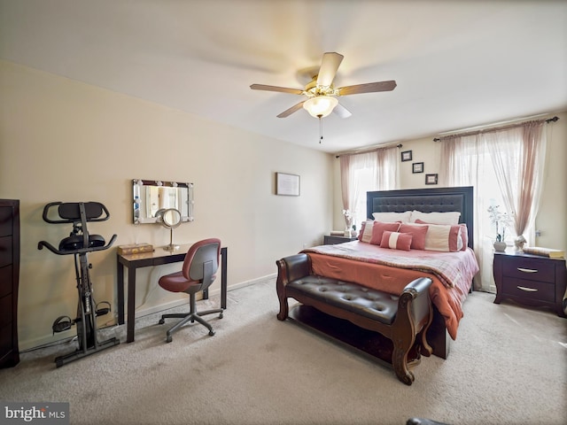 bedroom featuring carpet, baseboards, and ceiling fan