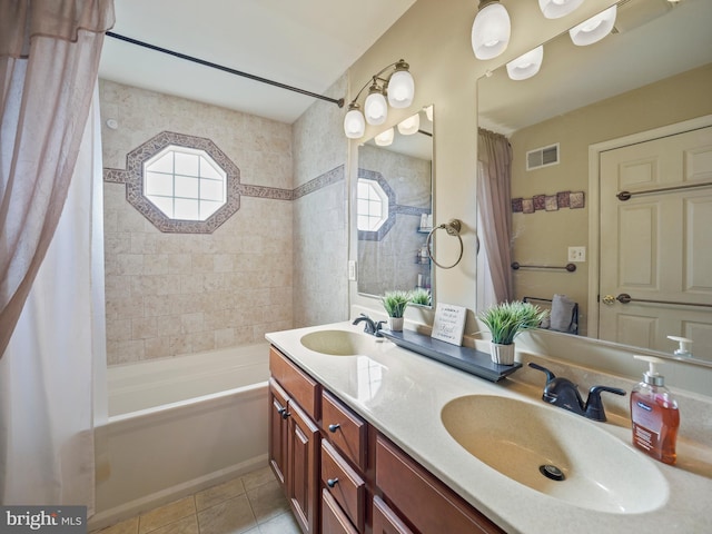 bathroom with visible vents, a sink, shower / bathtub combination with curtain, and tile patterned floors