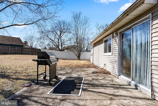 exterior space featuring a patio area and a fenced backyard