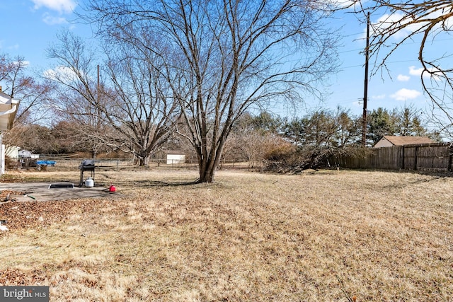 view of yard with fence