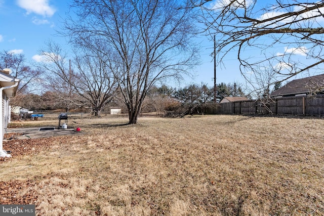 view of yard with fence