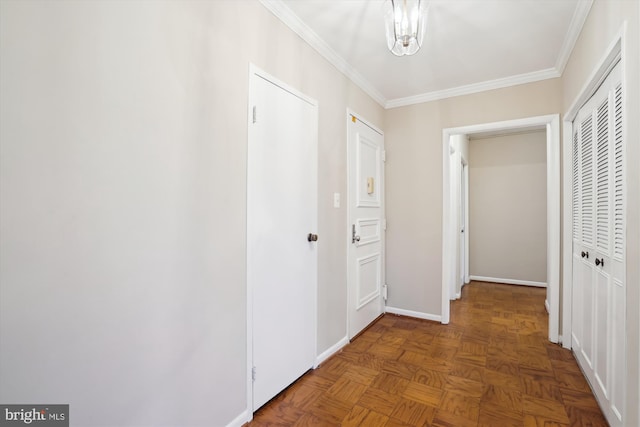 hall featuring ornamental molding and baseboards