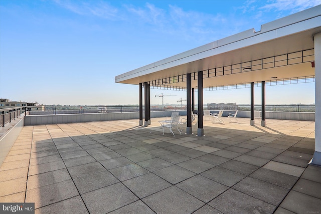 view of patio / terrace featuring fence