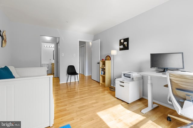 office space featuring light wood-style floors