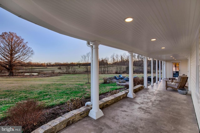 view of patio / terrace with a rural view