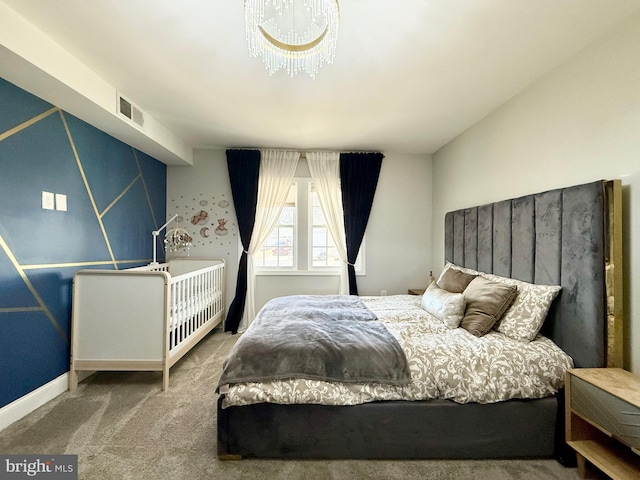 bedroom with carpet flooring and visible vents