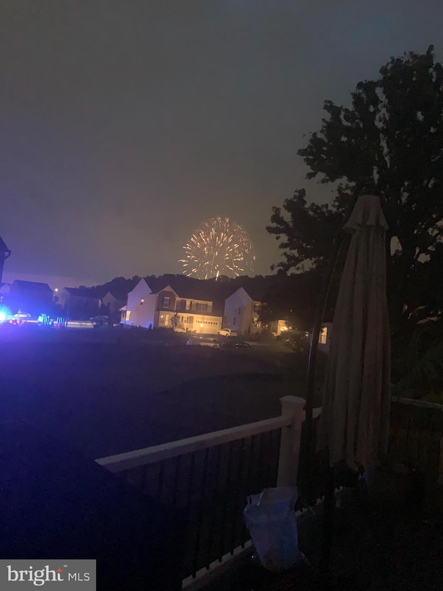 view of yard at night