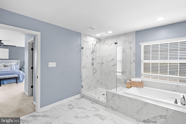 full bathroom with a garden tub, marble finish floor, a ceiling fan, a marble finish shower, and baseboards