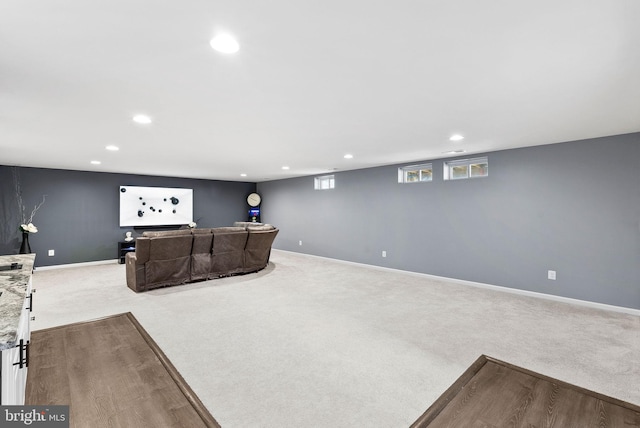 interior space featuring recessed lighting and baseboards