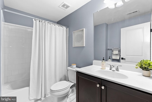 bathroom featuring shower / bath combo with shower curtain, visible vents, toilet, and vanity