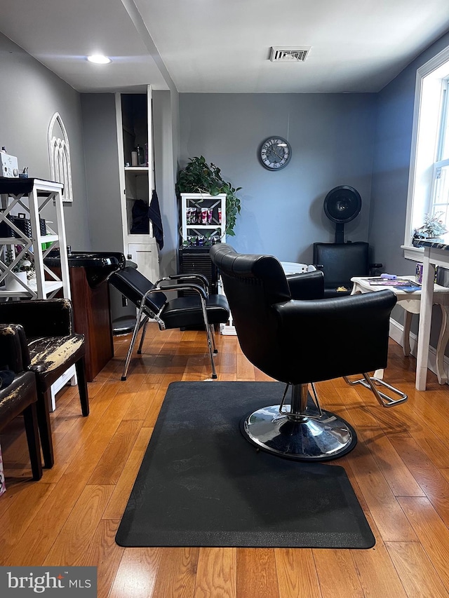 game room with light wood-type flooring and visible vents