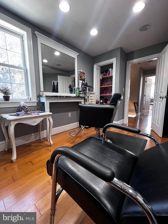 misc room with recessed lighting, baseboards, and hardwood / wood-style floors