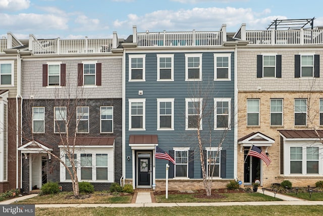 multi unit property featuring brick siding