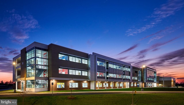 view of property at dusk