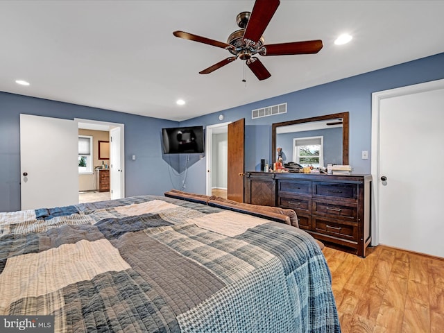 bedroom with light wood finished floors, ceiling fan, visible vents, and recessed lighting