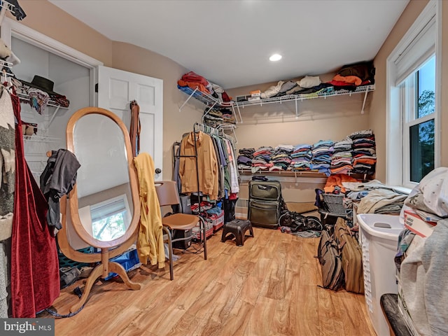 spacious closet with wood finished floors