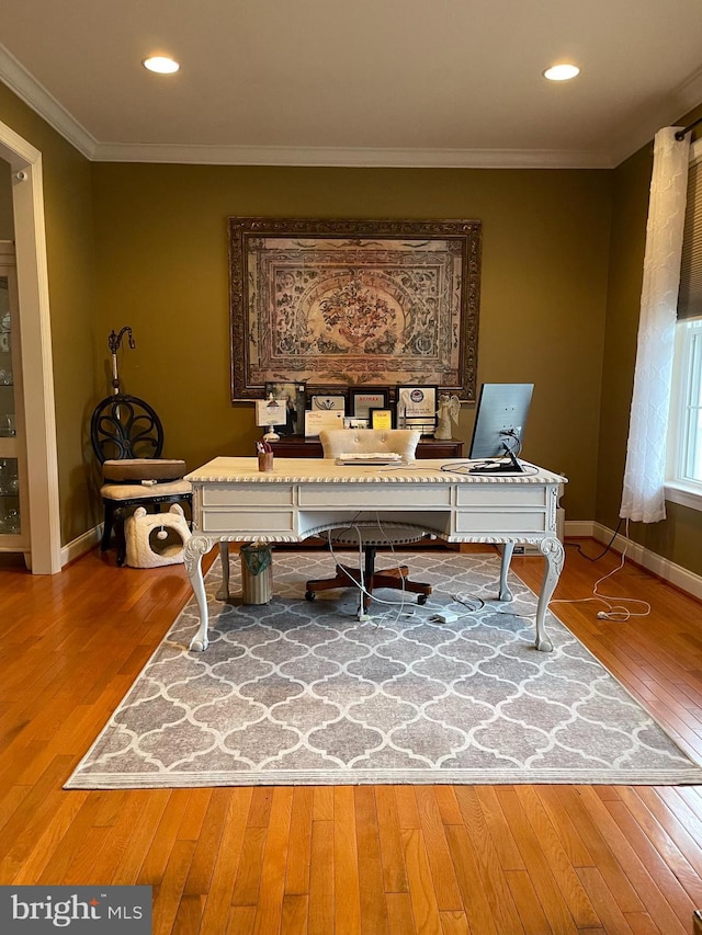 home office featuring ornamental molding, recessed lighting, baseboards, and hardwood / wood-style flooring